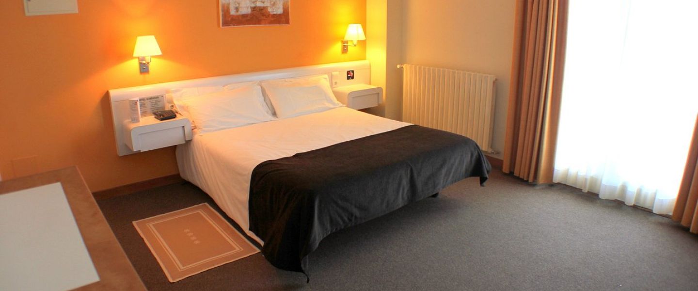 Chambre familiale avec vue côté lateral pistes